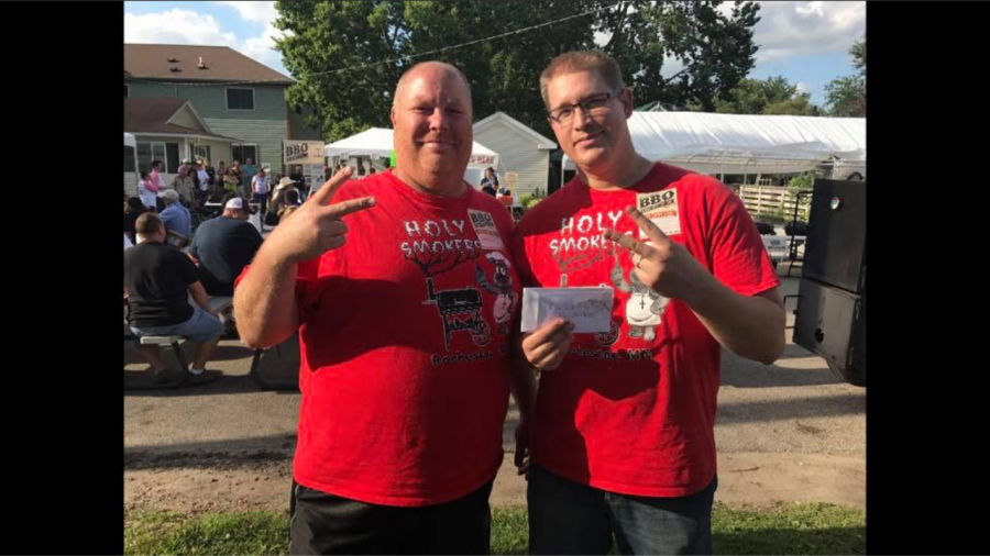 In his spare time, Andy Poterucha (right) enjoys barbecue with a teammate.